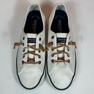 Sperry white canvas sneakers with leather laces. Size women’s 7.5